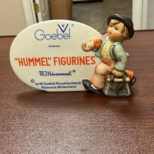 Goebel Hummel Figurine with Orange and Blue Accents